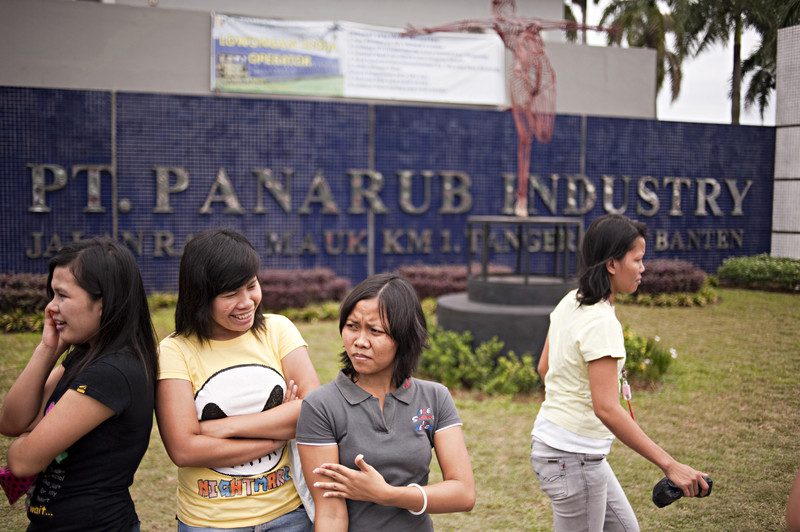 Female workers outside the PT. Panarub factory where Adidas sportswear is manufactured, Java, Indonesia. Photo: Dave Tacon/Polaris/OxfamAUS