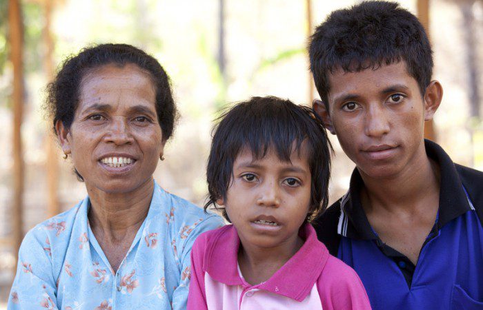 Alysia with two of her sons. Photo: Timothy Herbert/OxfamAUS