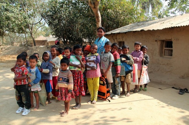Students of Muraripur Preschool line up outside the school with their teacher Sumitra Pana. "Earlier children were hesitant. They were scared...now they are more confident." Photo: Tania Cass