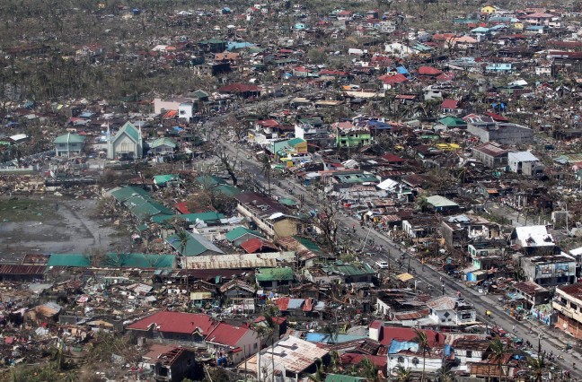 Aerial view of the damage in Leyte, 10 November 2013. Photo: AFP PHOTO/RYAN LIM/MALACANANG PHOTO BUREAU