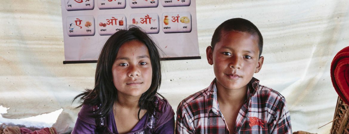Ravi* 11 and his sister Pabritra* 10 (* - not real names) in a temporary shelter after the Nepal earthquake. Photo: Aubrey Wade.