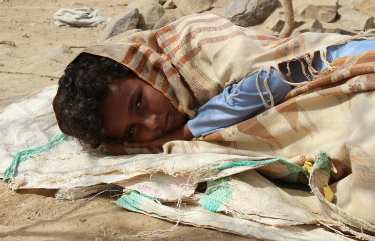Children sleep outside due to conditions in Yemen