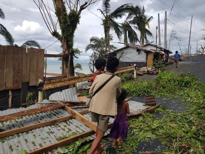 Walking through the wreckage caused by Typhoon Goni in Albay Bicol in the Philippines
