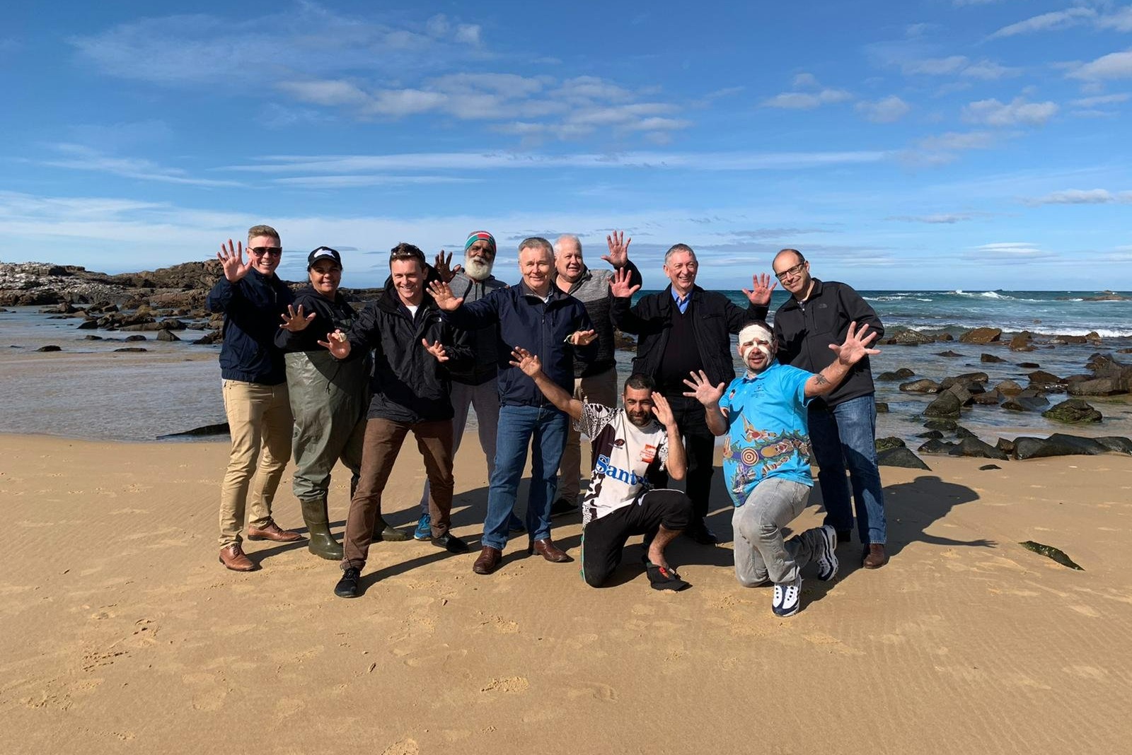 Members of the NSW Parliamentary Inquiry into Cultural Fishing, together with Traditional Owners, at Mystery Bay, NSW, on the morning of the hearing in Narooma in July 2022