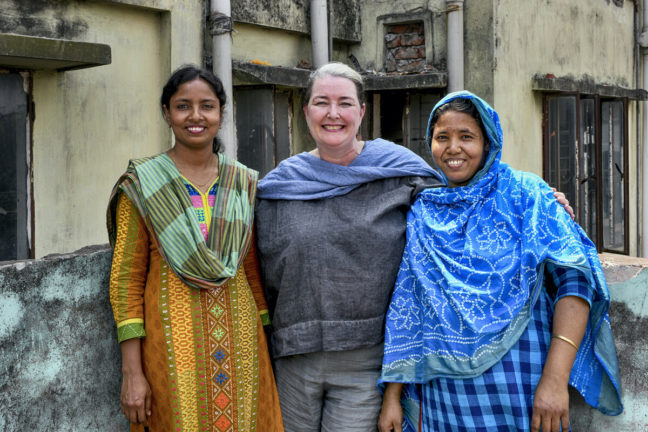 Dhaka, Bangladesh: Oxfam Australia's Chief Executive Lyn Morgain with garment worker *Parvin , Trade Union Leader rabeya Akhter.