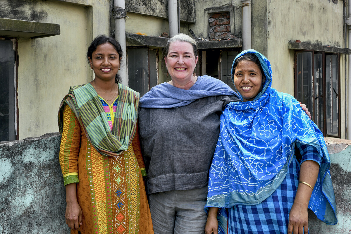 Dhaka, Bangladesh: Oxfam Australia's Chief Executive Lyn Morgain with garment worker *Parvin , Trade Union Leader rabeya Akhter.